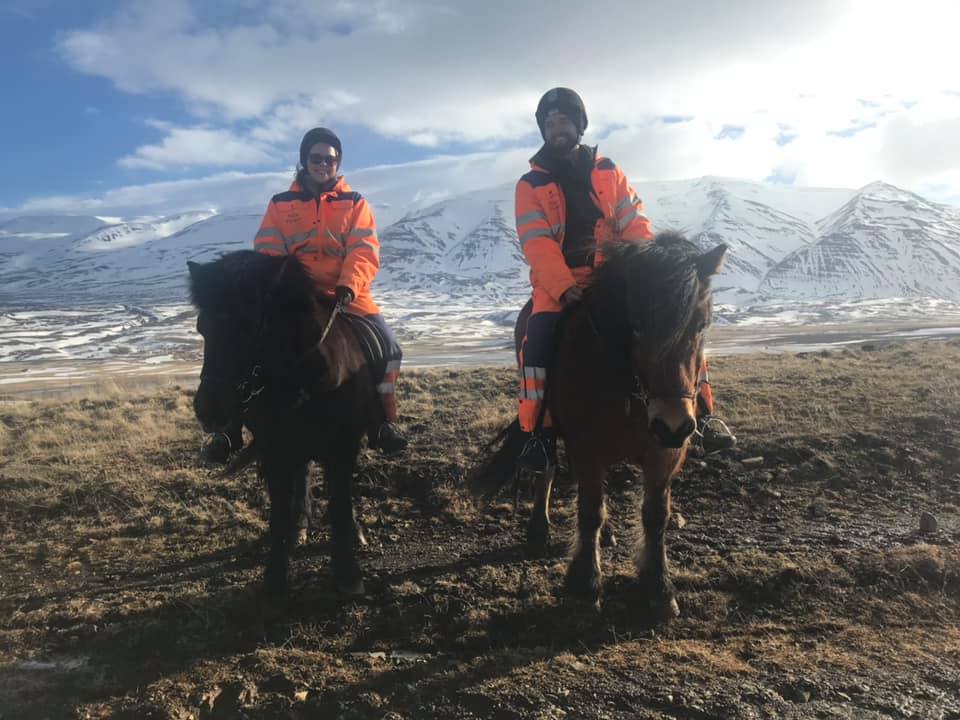 couple riding Icelandic horses