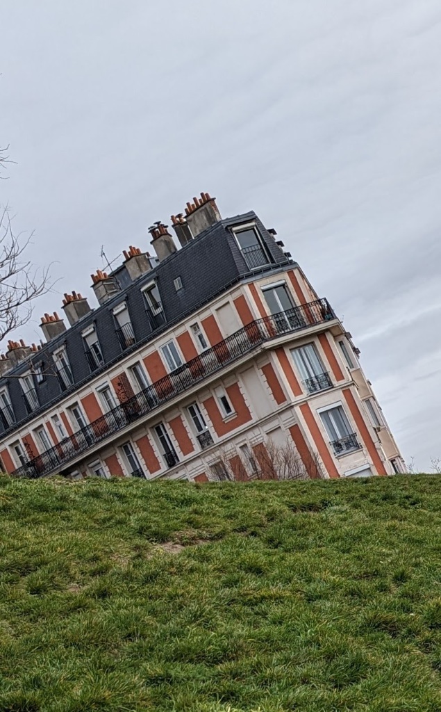 sinking house of Montmartre - an optical illusion of a house disappearing behind a hill